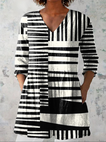 QIE | CAMICIA LUNGA CON FANTASIA D'IMPATTO