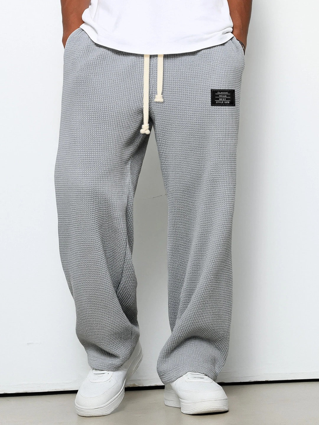 SAMUEL | PANTALONI LARGHI CON VITA REGOLABILE