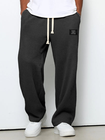 SAMUEL | PANTALONI LARGHI CON VITA REGOLABILE