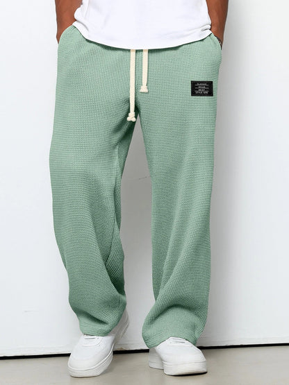 SAMUEL | PANTALONI LARGHI CON VITA REGOLABILE