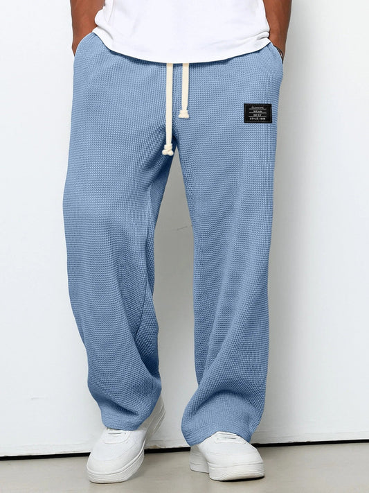 SAMUEL | PANTALONI LARGHI CON VITA REGOLABILE