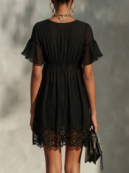 SILVIA – MINI-ROBE AVEC BORDURE EN DENTELLE ET FERMETURE ZIPPÉE